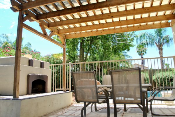 Backyard Entertaining area w/ fireplace & Pool